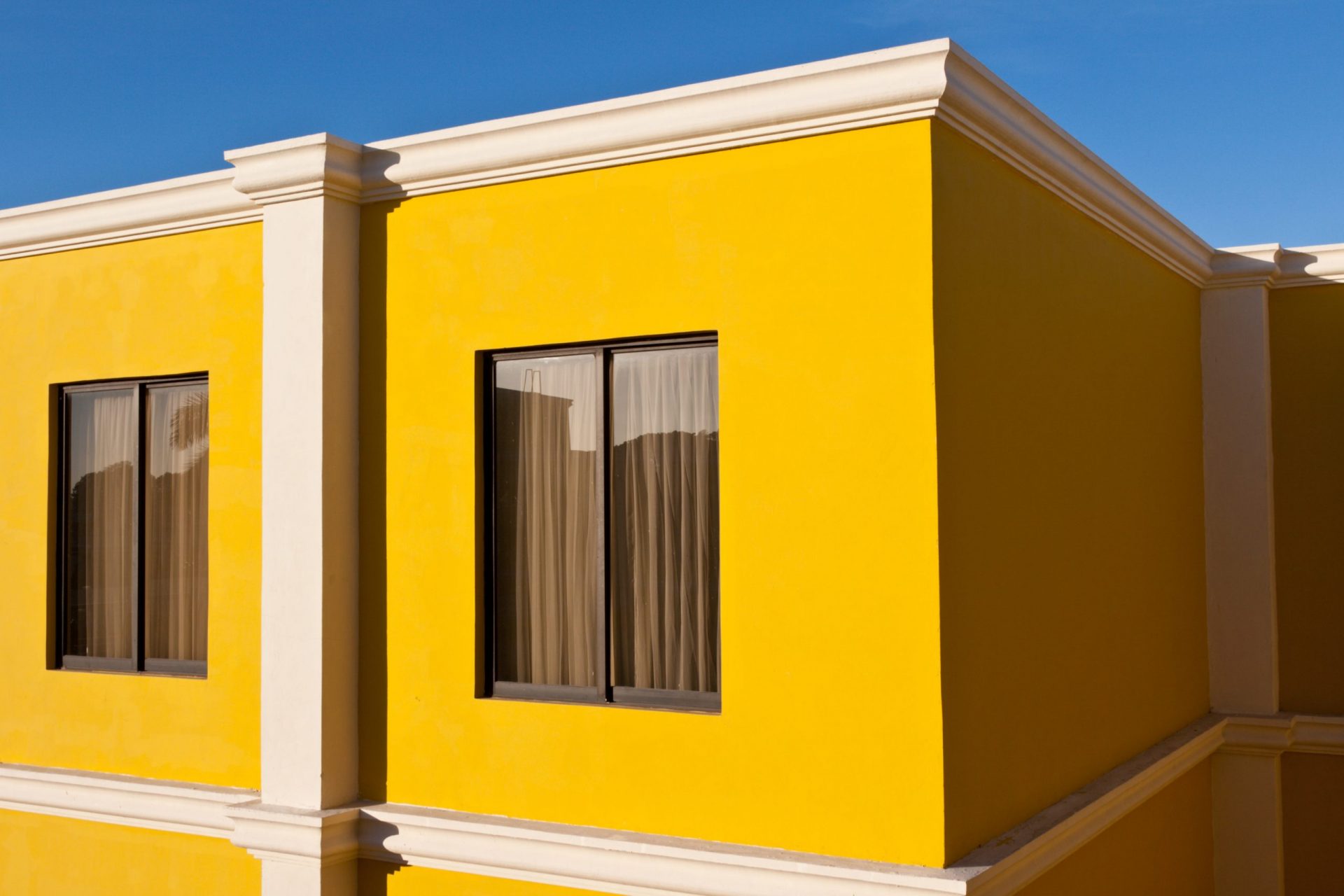 yellow-house-and-blue-sky-2024-10-17-10-55-30-utc